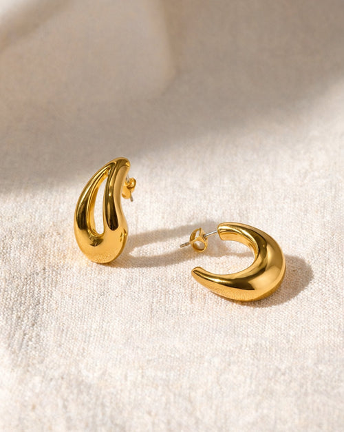 The Drop Hoop in gold, pair on linen